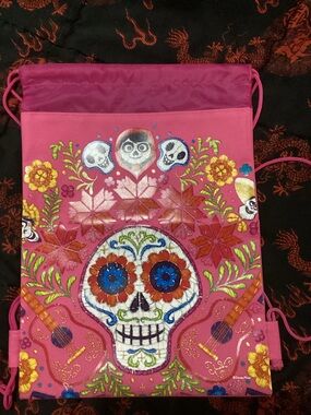 Disneys coco- Pink Embroidered Dia de los Muertos Drawstring Backpack